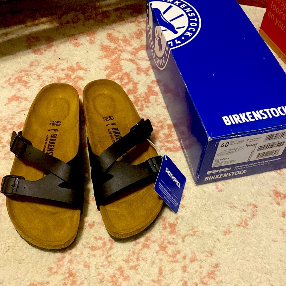 Women’s size 9 narrow Birkenstock sandal black. In original box